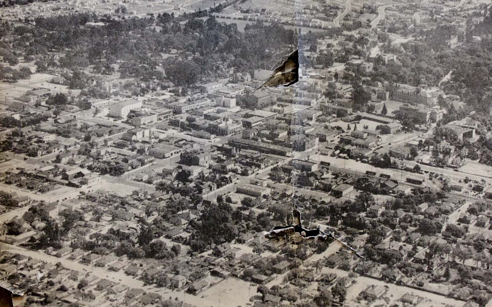 Aerial view of downtown San Mateo in 1936, showing the historic street grid and buildings of the city center